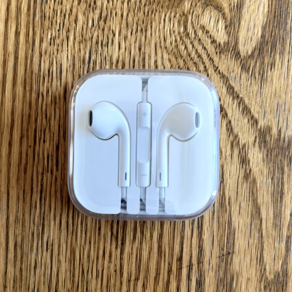 Apple Airpods (wired). New in factory seal.